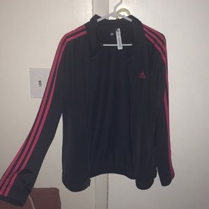 Zip up Adidas jacket.